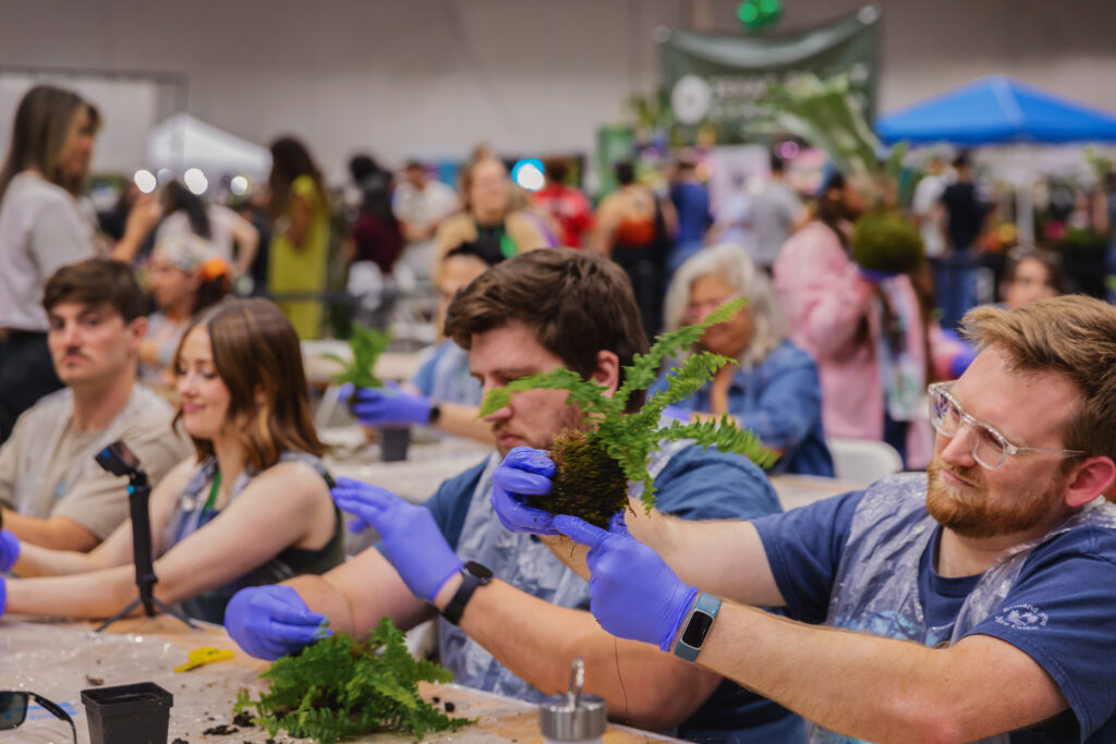 People participating in a workshop at PlantCon