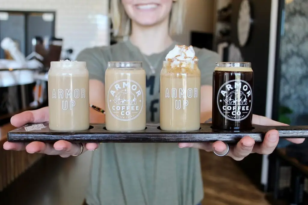 Coffee flight with four iced specialty drinks served at Armor Coffee Co. in Allen, Texas.